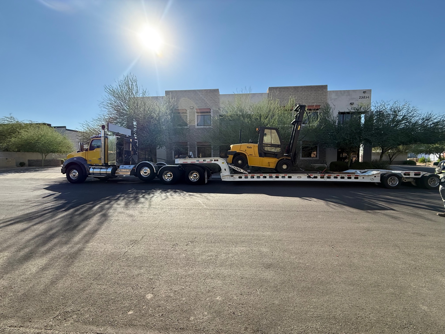 Sunny Heavy Hauling truck transporting equipment